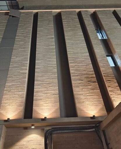Illuminated wood texture columns Ahmedabad