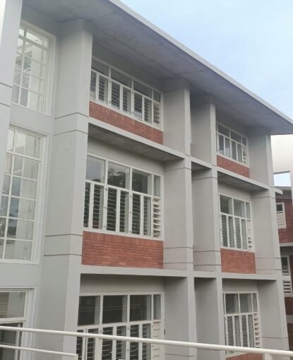 Orange panel expose concrete building Ahmedabad